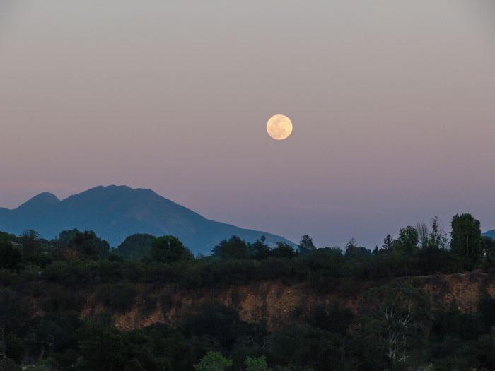 field mountain sunset moon