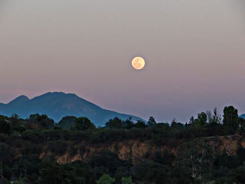 field mountain sunset moon