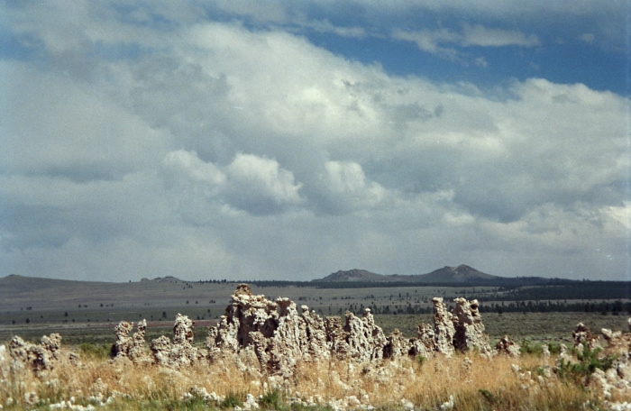 rock desert clouds