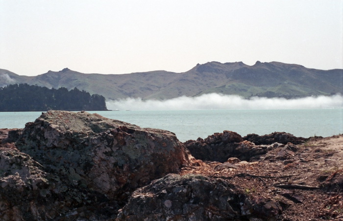 sea rock clouds