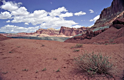 rock erosion desert clouds