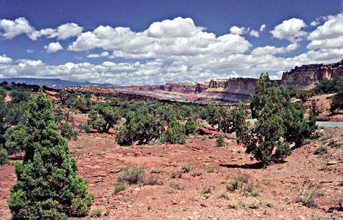 rock erosion desert clouds