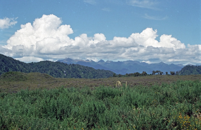 mountain field clouds