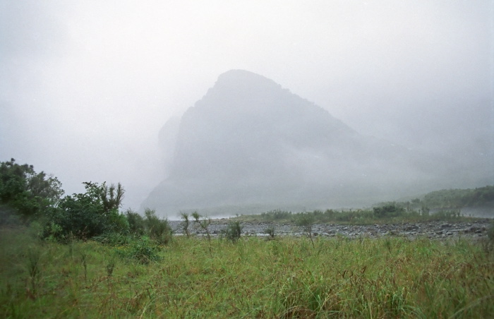 mountain field clouds