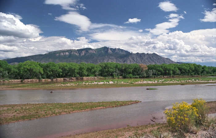 desert river mountain clouds